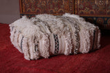 Handwoven berber old rug pouf