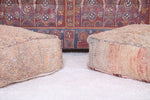 Two berber moroccan azilal rug poufs