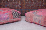 Two moroccan berber hamdmade red rug poufs