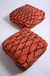 Two handmade berber red orange rug poufs