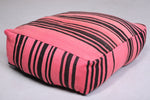 Two moroccan berber handmade pink woven poufs