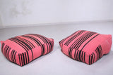 Two moroccan berber handmade pink woven poufs