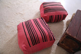 Two moroccan berber handmade pink woven poufs