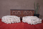 Two berber moroccan handmade woven old rug poufs