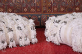 Two berber moroccan handmade woven old rug poufs