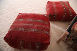 Two Moroccan berber handmade woven red Poufs