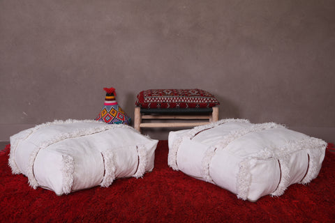 Two moroccan berber handwoven ottoman rug poufs