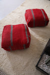 Two handmade Moroccan berber red kilim rug poufs