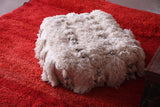 Berber handwoven wedding blanket rug pouf