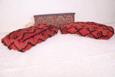 Two berber handmade moroccan red rug long poufs