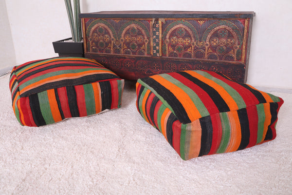 Two colorful handmade berber Moroccan rug poufs | Vibrant handwoven poufs