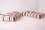 Two flatwoven berber handmade vintage rug poufs