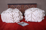 Two round moroccan berber handmade woven rug poufs