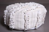 Two round moroccan berber flatewoven poufs