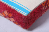 Moroccan handmade rug red berber old pouf