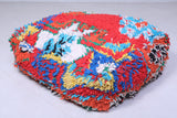 Two handmade handmade rug poufs