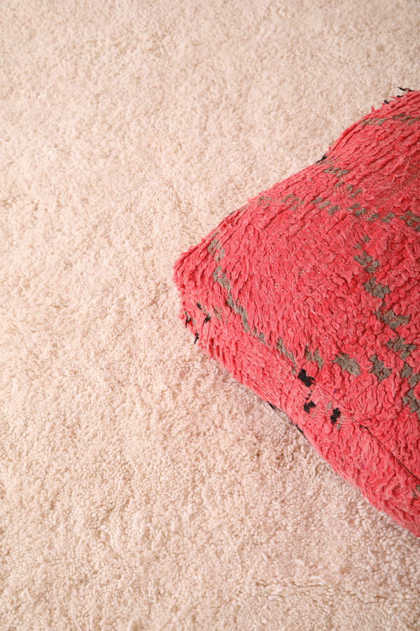 Handmade red berber old azilal rug pouf – Moroccan vintage accent piece