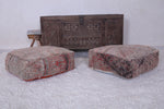 Two handmade berber moroccan azilal rug poufs