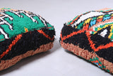 Two berber handmade moroccan rug poufs
