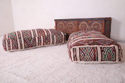 Two moroccan poufs berber ottoman handmade rug