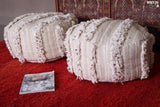 Two round moroccan berber flatewoven poufs