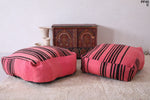 Two moroccan berber handmade pink woven poufs