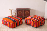 Two Moroccan handwoven berber kilim rug poufs