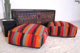 Two Moroccan colorful kilim woven berber rug poufs