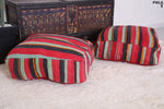 Two flatwoven berber Moroccan rug poufs