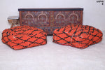 Two handmade berber red orange rug poufs