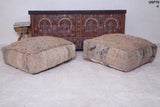 Two handmade moroccan berber vintage rug poufs