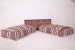 Two moroccan poufs berber ottoman handmade rug